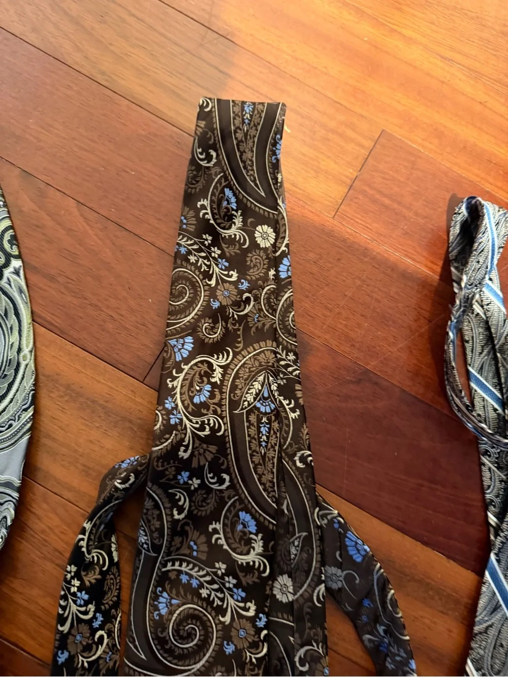 Four Ties including Geoffrey Beene and Paisley Silk